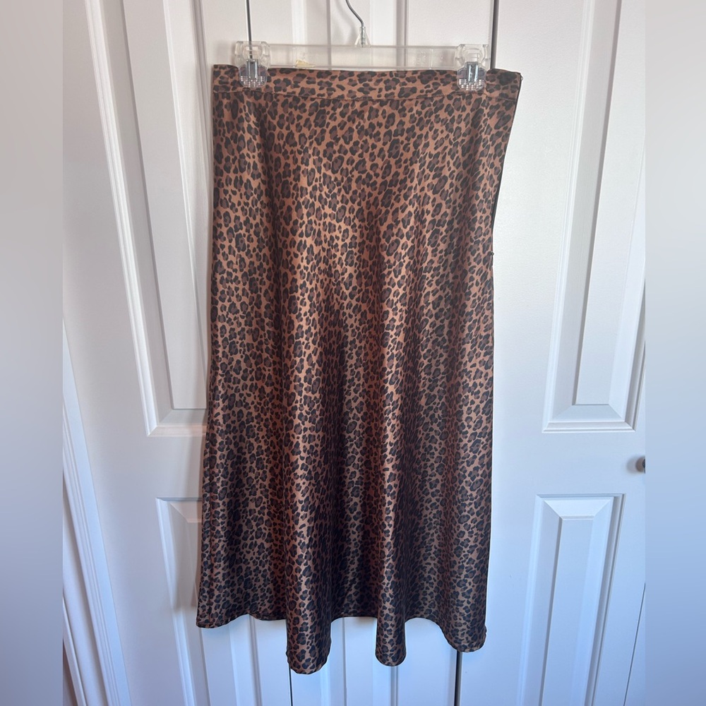 Ricki’s Cheetah print bias cut stretch satin skirt sz 6